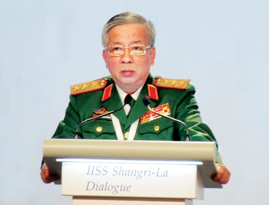 Deputy Defence Minister Nguyen Chi Vinh delivers a speech at the 15th Shangri-La Dialogue in Singapore on June 5